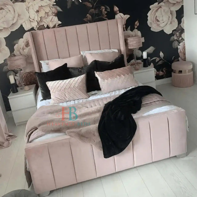Wingback bed frame in pink plush velvet